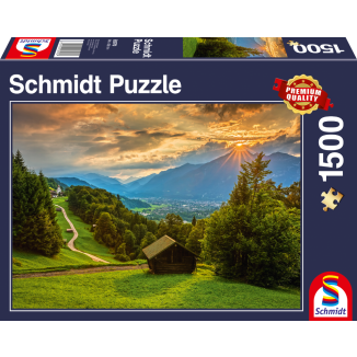 Vorderseite der Verpackung vom Artikel 58970, Sonnenuntergang über dem Bergdorf Wamberg, 1.500 Teile Puzzle