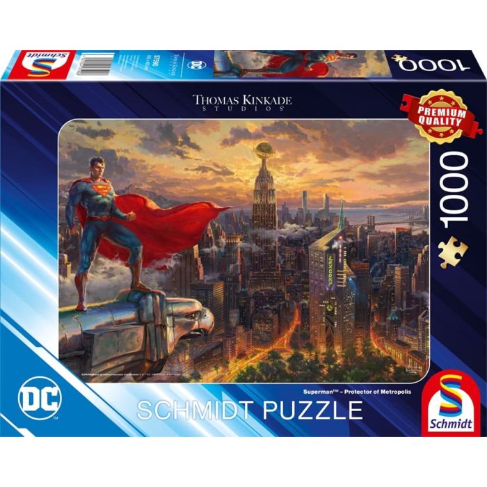Vorderseite der Verpackung vom Artikel 57590, Thomas Kinkade Studios: Superman - Protector of Metropolis, 1.000 Teile Puzzle Vorderseite der Verpackung vom Artikel 57590, Thomas Kinkade Studios: Superman - Protector of Metropolis, 1.000 Teile Puzzle