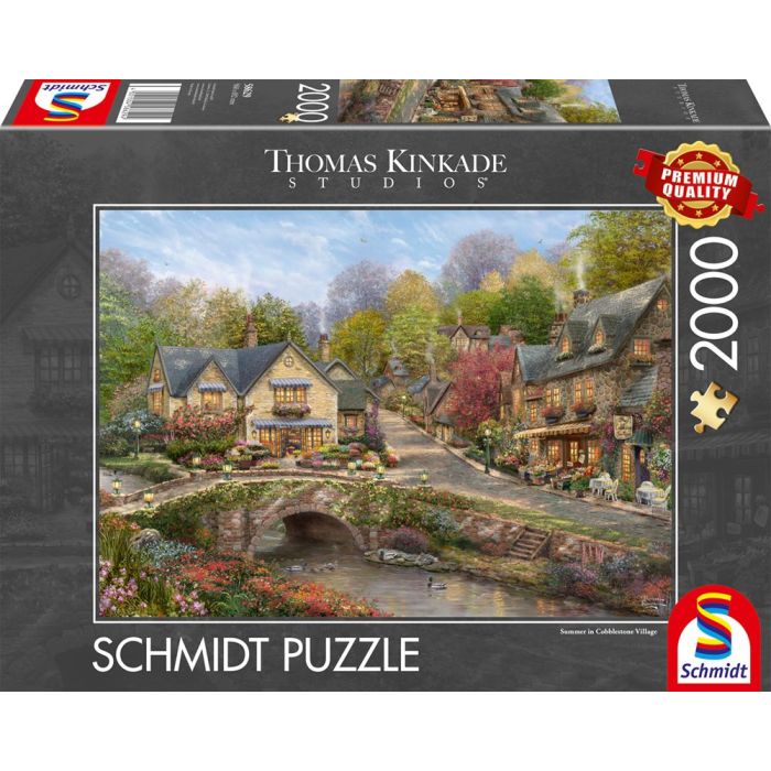 Vorderseite der Verpackung vom Artikel 58629, Thomas Kinkade Studios: Sommer in Cobblestone Village, 2.000 Teile Puzzle Vorderseite der Verpackung vom Artikel 58629, Thomas Kinkade Studios: Sommer in Cobblestone Village, 2.000 Teile Puzzle