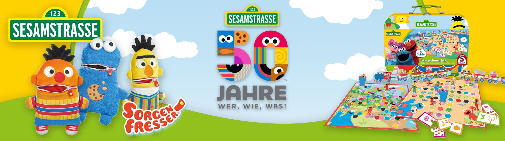 Sesamstraße feiert 50 Jahre: Sorgenfresser-Bert und Ernie, großes Spieleset mit Spielfiguren und buntem Spielplan im Hintergrund.